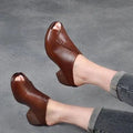 Women's black square heel peep-toe sandals with open fish-mouth design and a rubber sole.