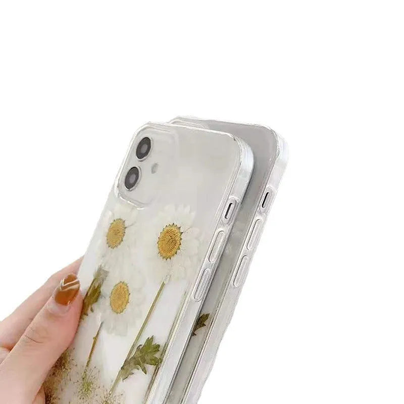 White epoxy daisy floral design TPU phone case for iPhone, showing back cover.