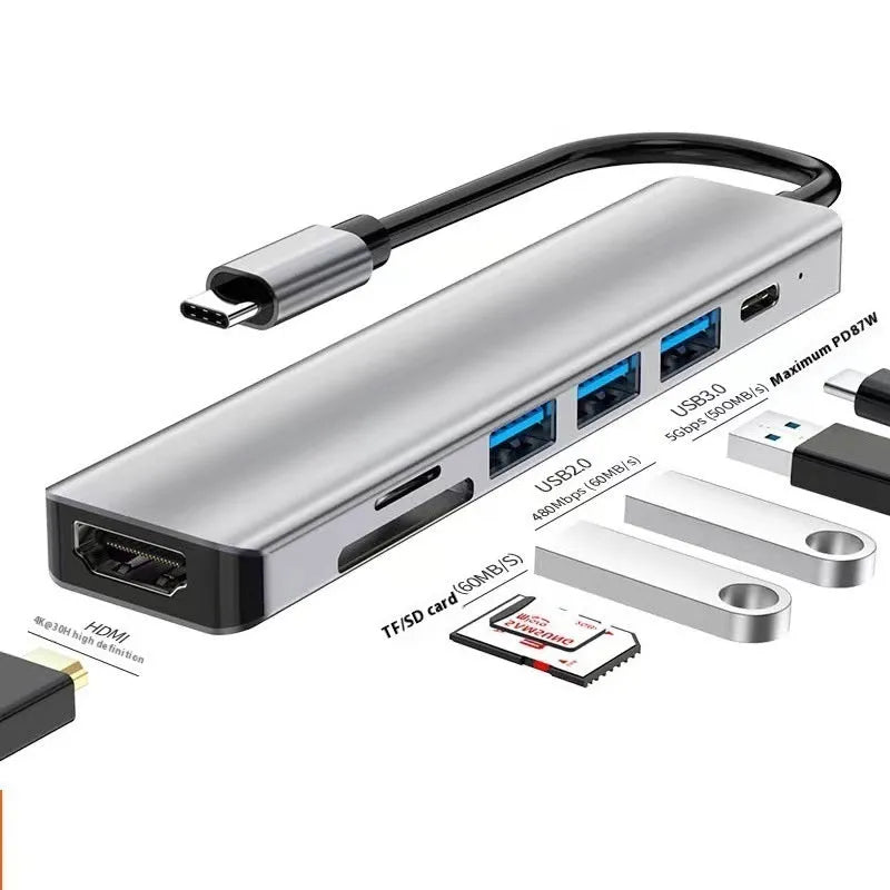 A USB-C 7-in-1 multi-function expansion dock hub with an attached 15cm cable.