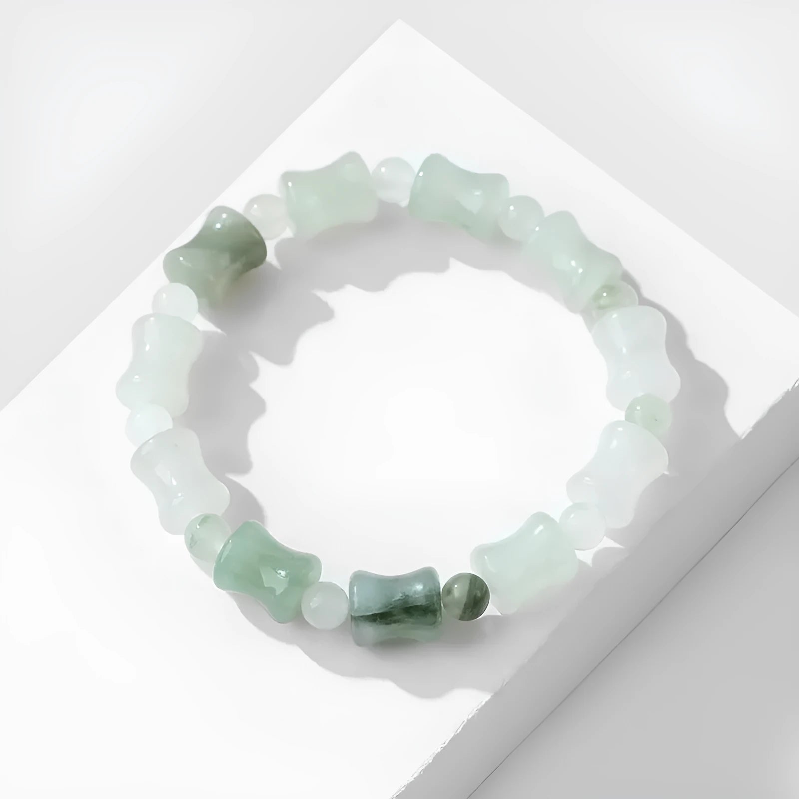 Natural chalcedony beaded bracelet with diamond-shaped jade stones and coconut shell beads on elastic string
