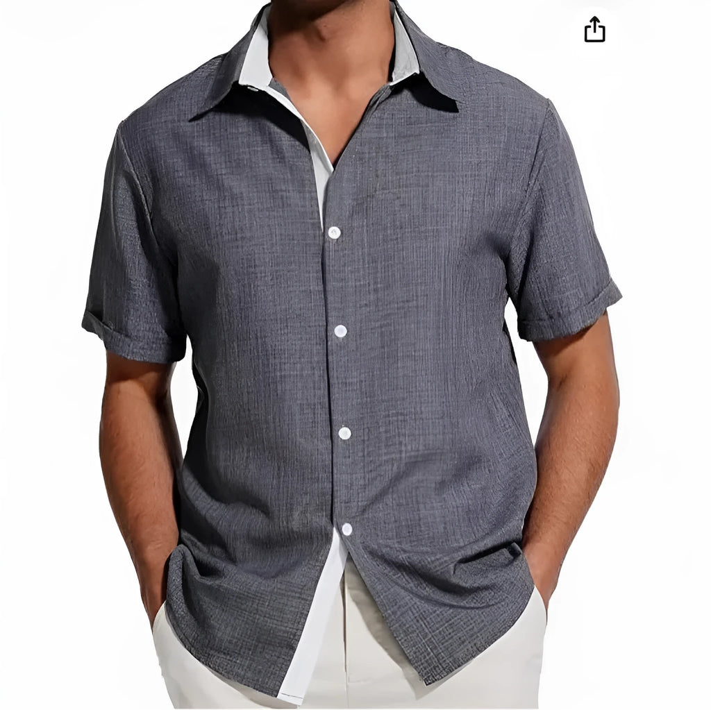 Men's short-sleeved floral print shirt in lightweight polyester fabric on a hanger.