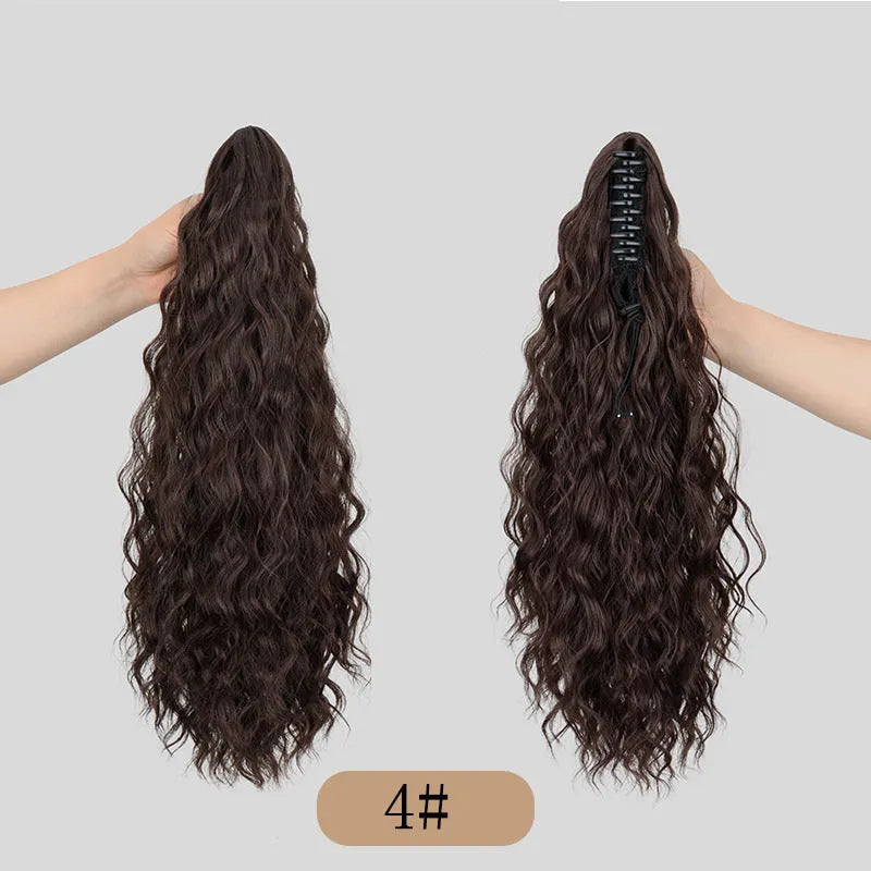 Synthetic corn curler wig with a textured water ripple grip ponytail, shown in a shade from the available colour range.