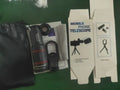 Mobile phone long-focus telephoto lens bracket set with 18× monocular telescope standard set on a smartphone