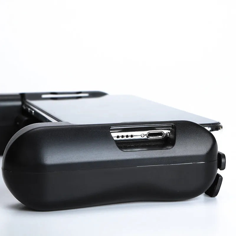 Black Cooling Bluetooth P2 mobile game controller for iPhone on a dark background.