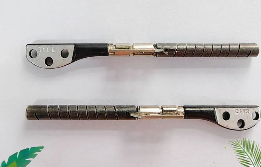 Pair of silver laptop screen hinge shafts for Apple MacBook Pro 15-inch A1286 model.