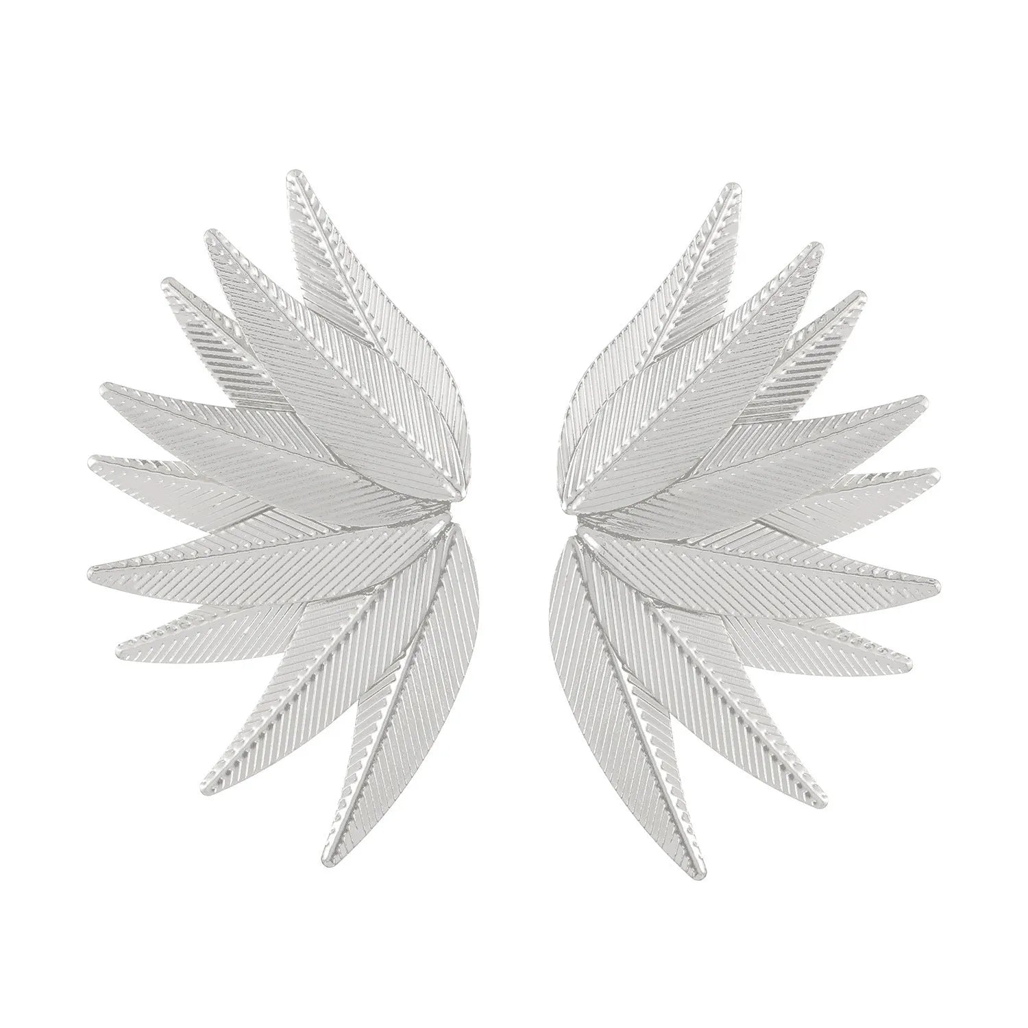 Gold and white alloy leaf-shaped patch earrings on a plain background