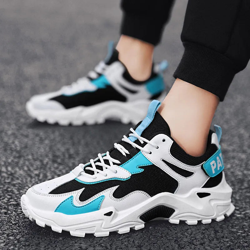Men's breathable casual sneakers in black white colour-blocked pattern with lace-up front