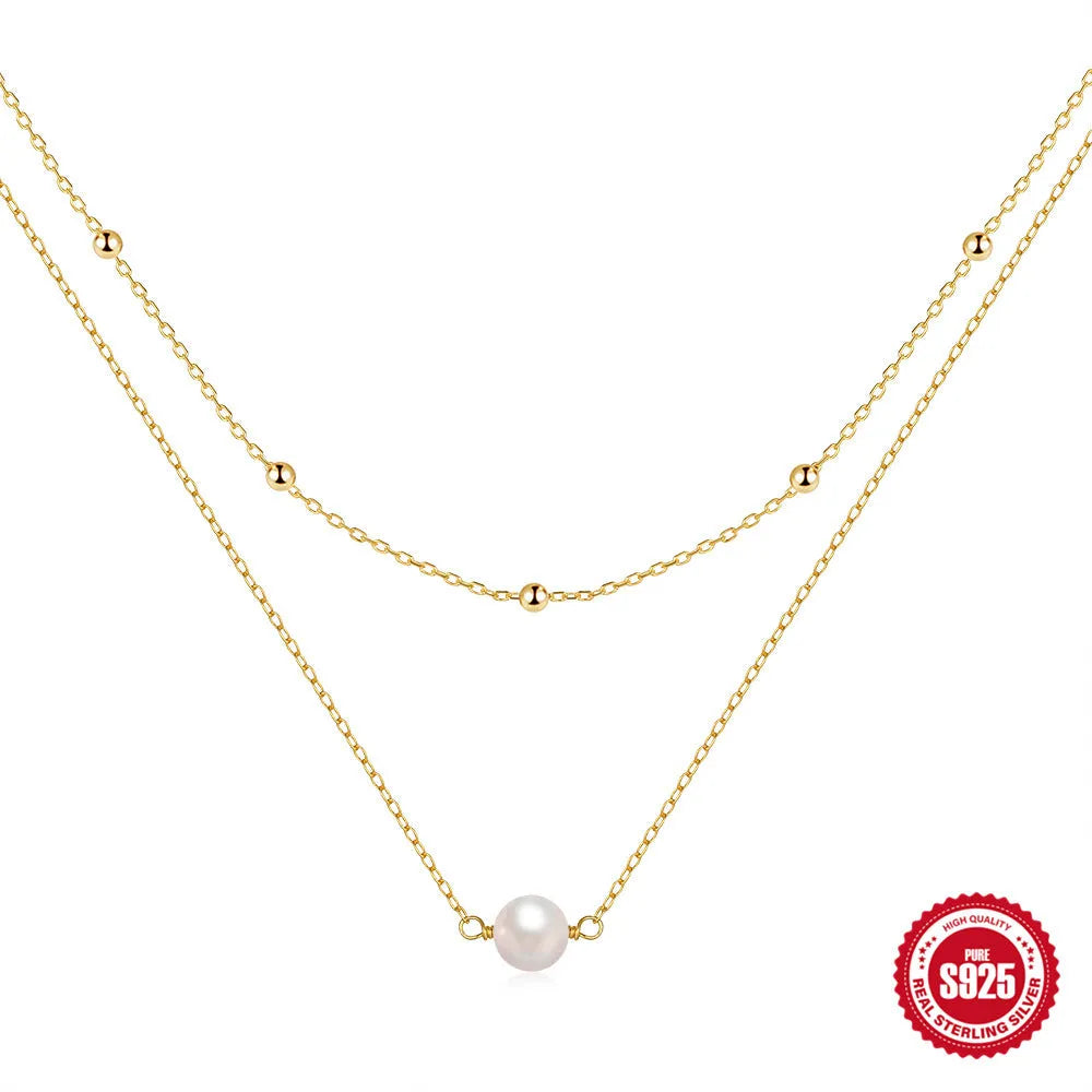 S925 sterling silver double layer pearl necklace with geometric pendant on a ball bead chain.