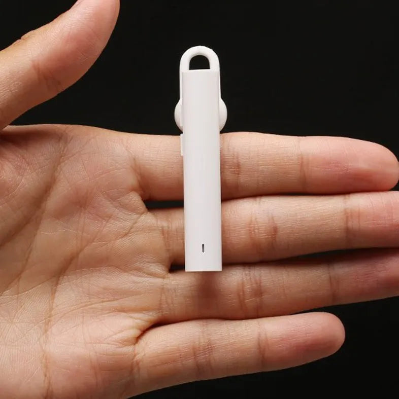 Compact wireless Bluetooth headset showing black and white colour options with 5.6cm dimensions