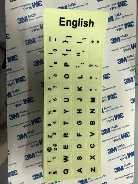 Yellow glowing PVC keyboard stickers with Arabic, Thai, Hebrew, French, Italian, and German language characters