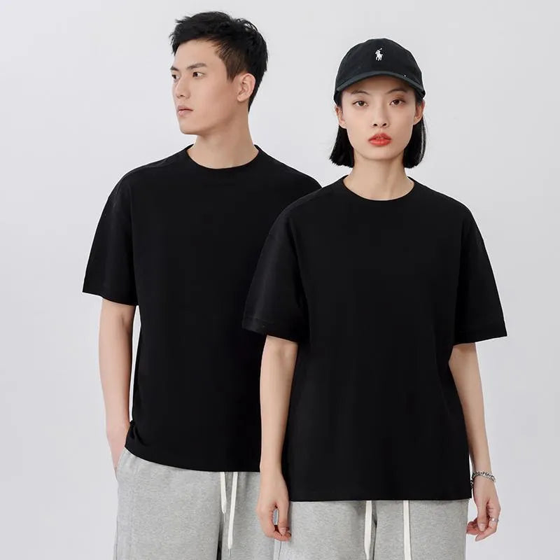 Breathable cotton pique short-sleeved T-shirt in a loose pullover style on a solid colour background.