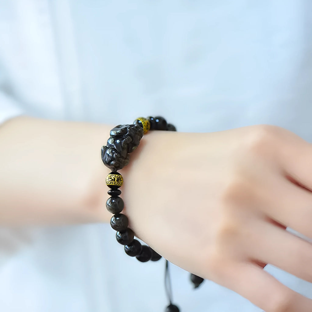 Hand-woven golden obsidian Pi Xiu bracelet with animal zodiac modelling in Chinese style
