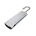 Grey aluminium USB-C docking station with 4K HDMI, VGA, and USB ports, showing 140mm attached cable.