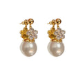 Female Korean style double-sided flower pearl earrings in gold plated copper with clip-on design