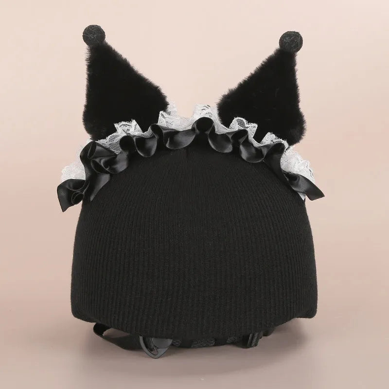Soft plush cartoon character cover stretched over a pair of black on-ear headphones.