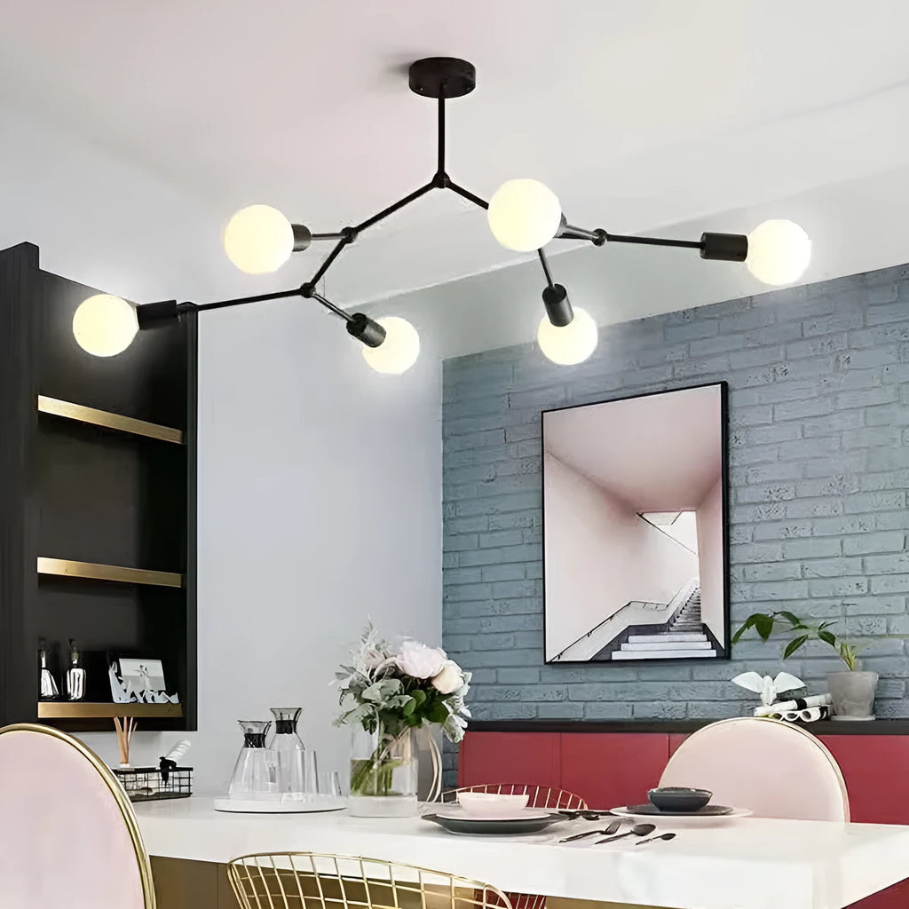 Minimalist black iron ceiling chandelier with six light heads in a Nordic style, against a white background.