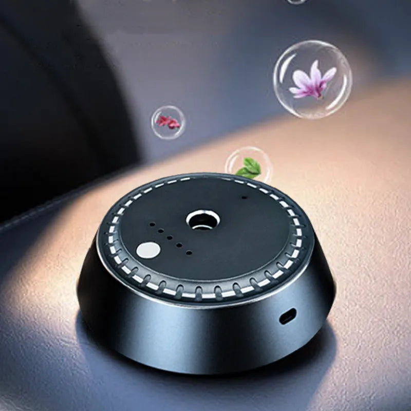 Black metal USB rechargeable car aroma diffuser showing compact size and design