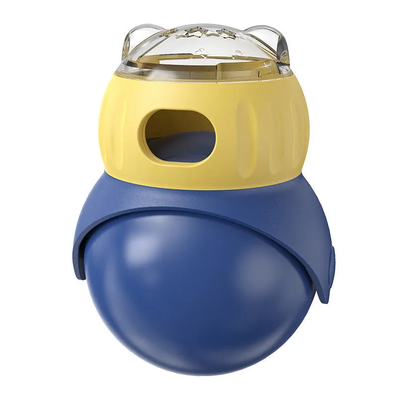 Morandi yellow and blue plastic owl-shaped cat puzzle feeder toy on a wooden floor.