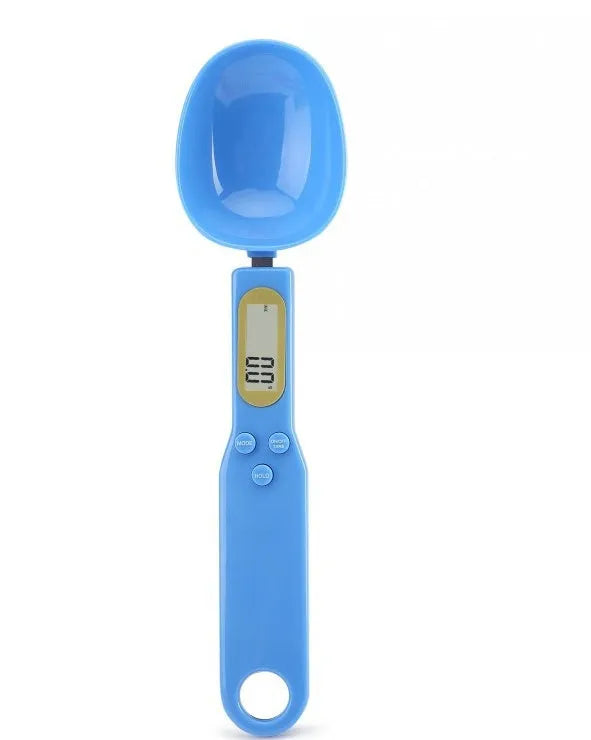 White digital kitchen spoon scale with LCD display showing weight measurement