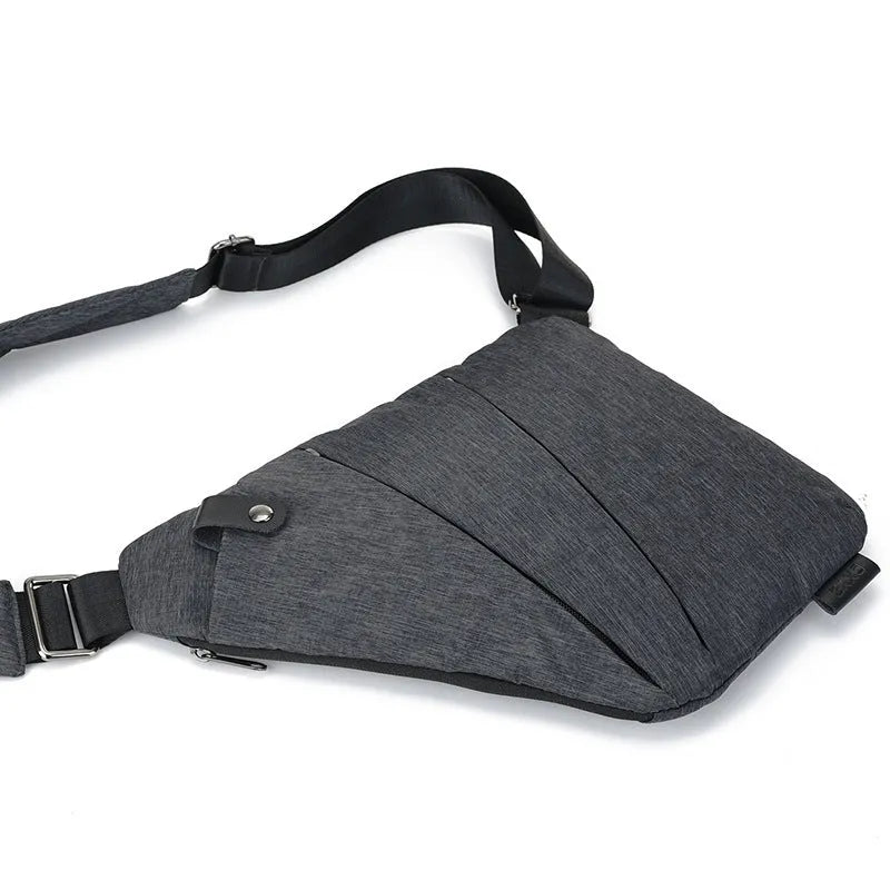 Canvas chest bag for men in black Oxford cloth with zipper closure, worn across the chest for anti-theft security