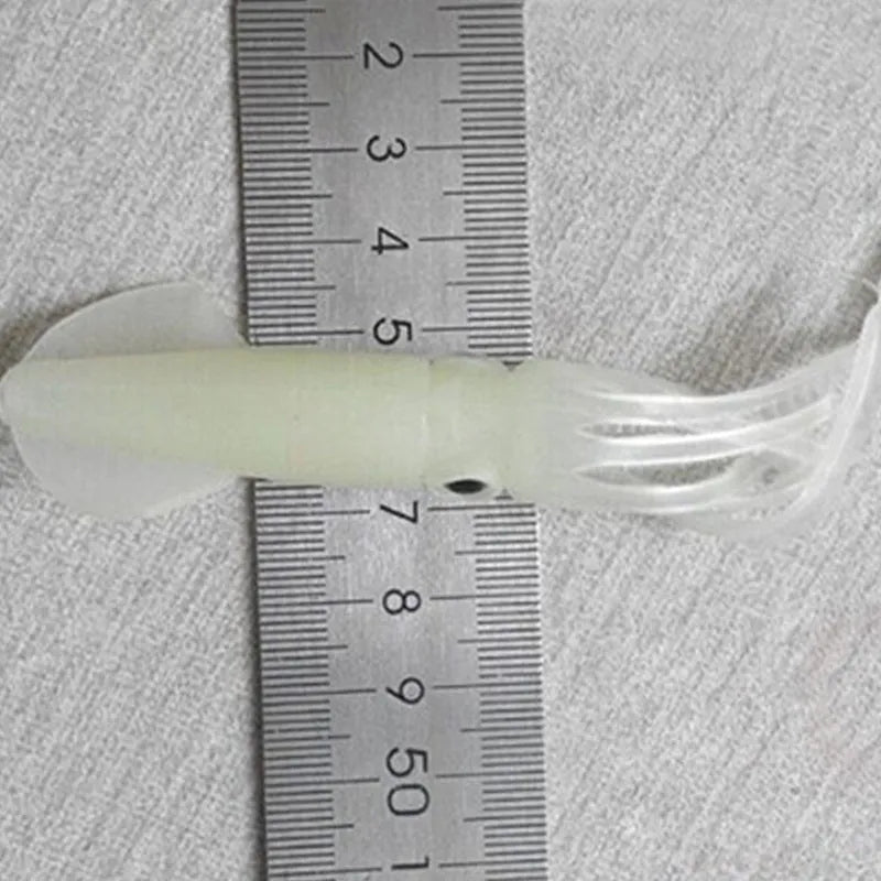 Pack of 10 luminous squid baits in light green, 105mm long, soft plastic bionic shape