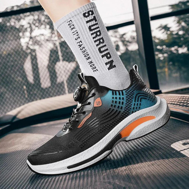 Men's low-top sneaker in white and orange colourway, showing mesh texture and rubber sole.