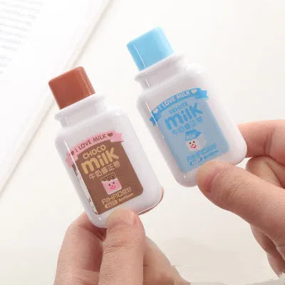 Creative bottle-shaped correction tape dispenser with cute pattern, showing 6-metre length.