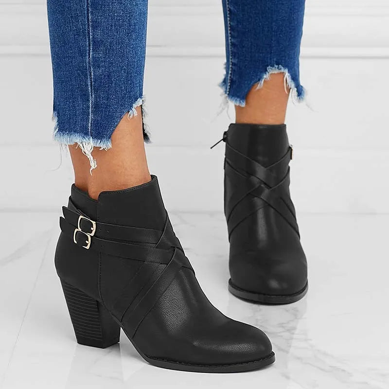 Women's black PU leather short boots with a side zipper and a 7cm thick chunky heel.