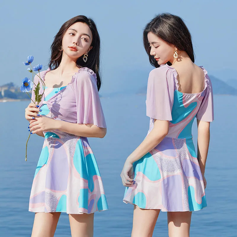 Light purple floral high-waist one-piece skirt swimsuit for women.