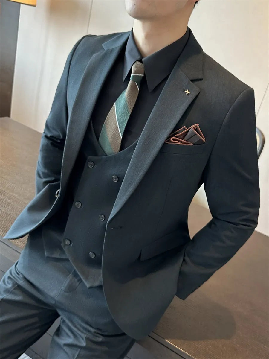 Men's slim-fit dark green business blazer on a hanger