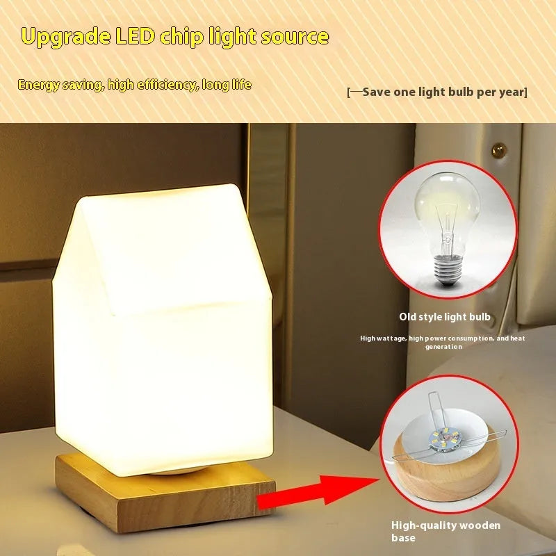 Nordic style solid wood USB table lamp in a cube shape with touch dimming on a wooden desk.