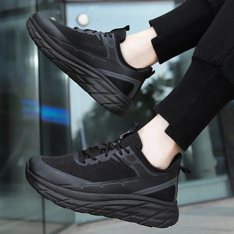 Men's thick-soled anti-skid lace-up casual sneakers in black with rubber sole and PU upper