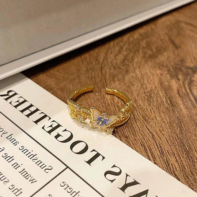 Copper women's ring with Chinese butterfly design and oil-drip finish in simple jewellery style