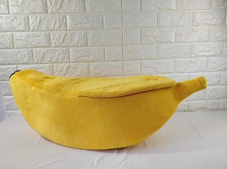Banana shape pet house dog bed in yellow super soft short plush fabric with thick sponge cushioning