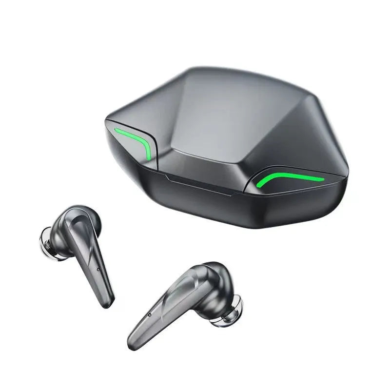 Black wireless gaming earbuds and a compact rectangular charging case on a grey surface.