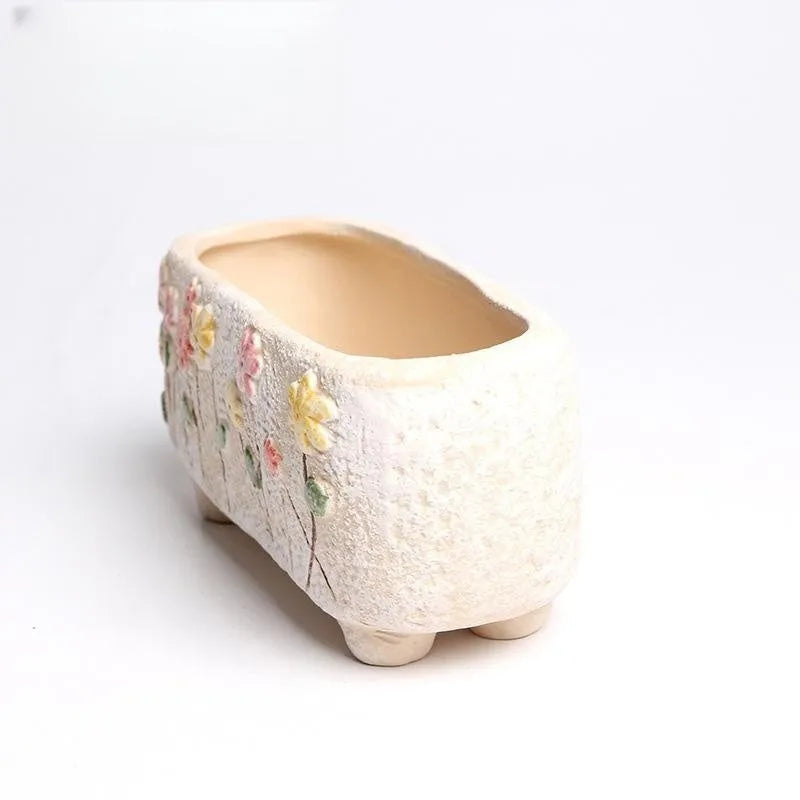 Rectangular hand-painted ceramic succulent flower pot showing floral design