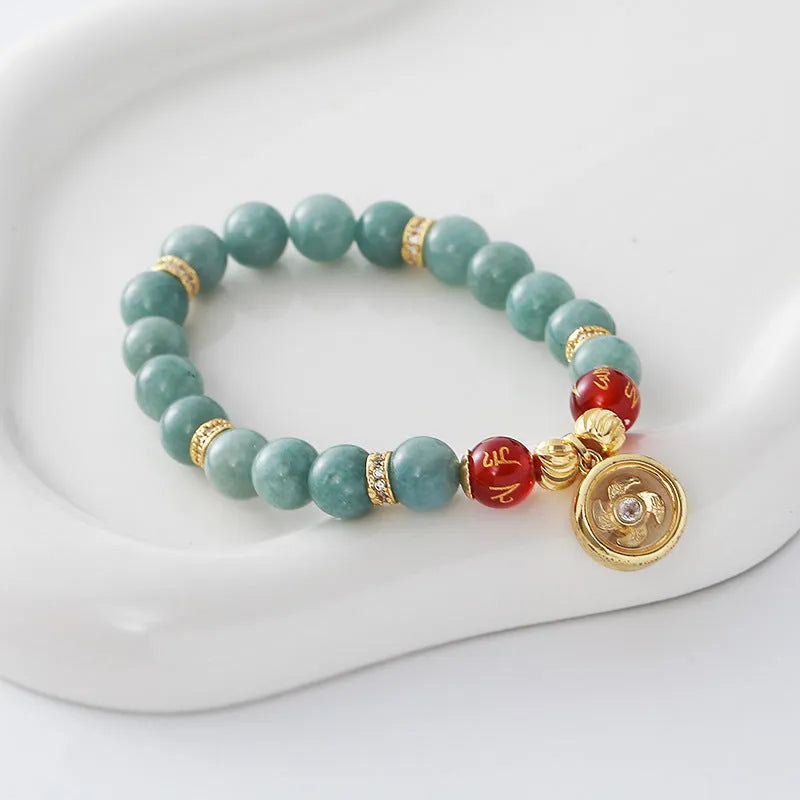 Natural agate lotus seedpod bracelet with jade colour electroplated finish on wrist
