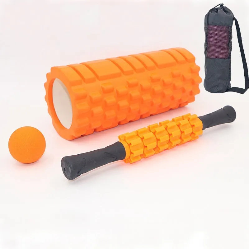 Black six-piece foam massage roller stick with gear design, 33cm long.