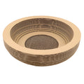 Brown compressed paper cat scratch board with 40cm diameter and 11cm height on a wooden floor