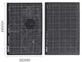 Green A3 self-healing cutting mat showing centimetre grid lines and double-sided design