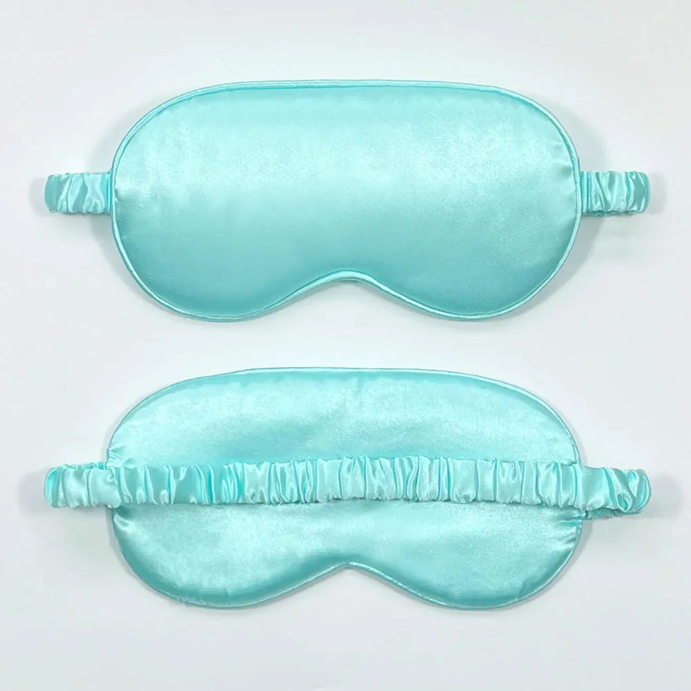 Double-sided silk-like eyeshade in rayon elastic satin shown in multiple colour options including black, beige, and wine red