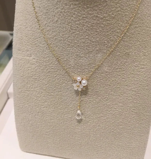 Sterling silver 925 K gold plated pendant necklace with 6mm white shell pearl, 4mm crystal, and 42+5cm clavicle chain.