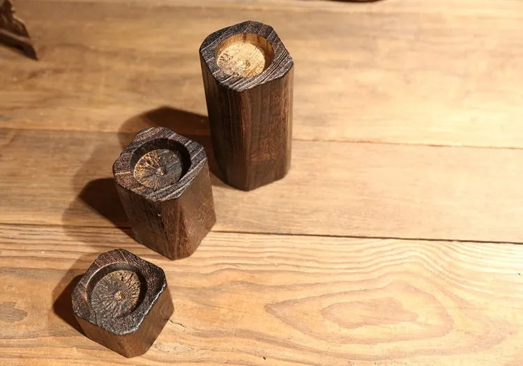 Set of three solid wood candle holders in natural paulownia with charcoal finish, small 5cm, medium 10cm, large 15cm, square top 6x6cm