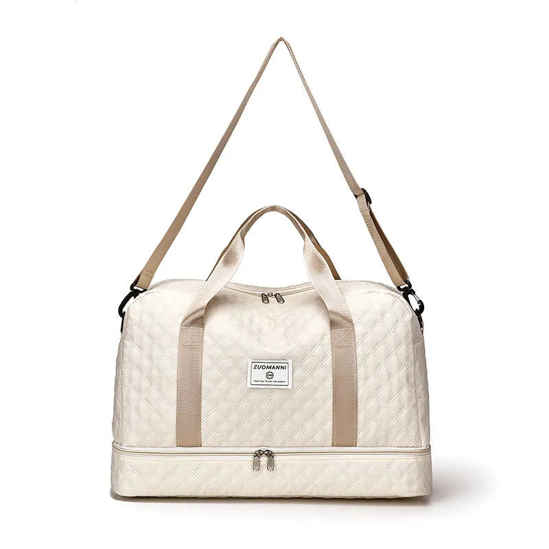 Oxford cloth portable travel bag in a solid colour with large capacity for buggies and leisure gear.