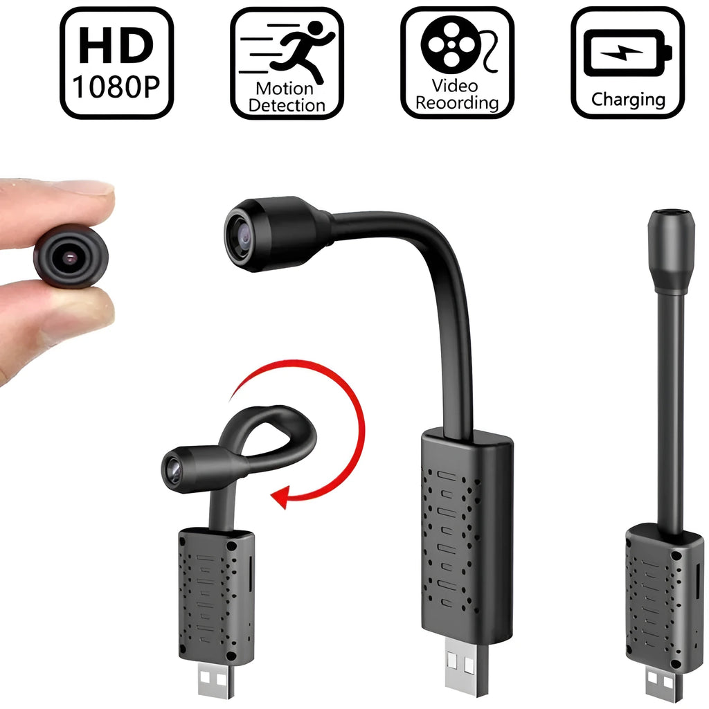 Black V380 wireless USB security camera on a wooden surface next to a microSD card and USB cable.