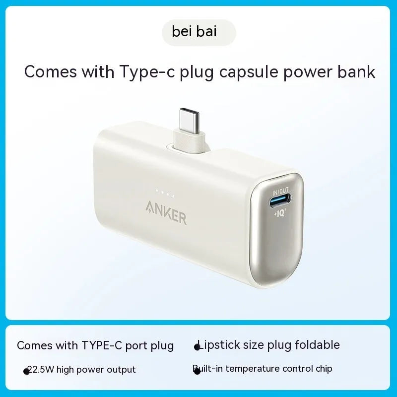 Small capsule-shaped power bank in multiple colours showing USB-C port and compact size.