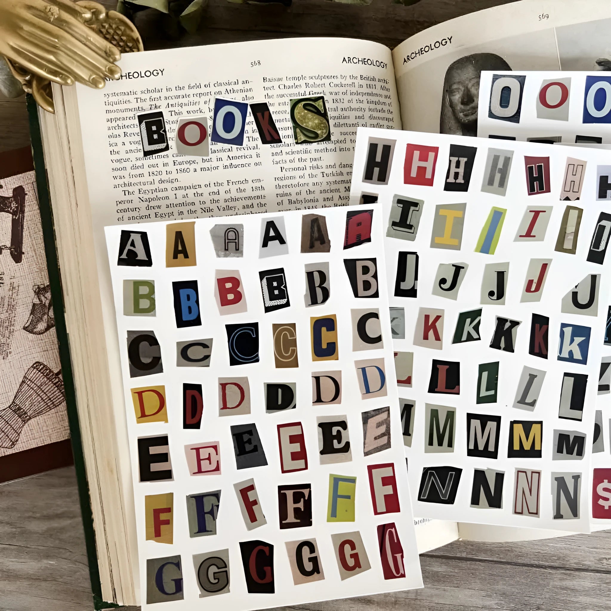 Pack of decorative stickers showing printed English alphabet letters and weekday words in a cute style for crafts.