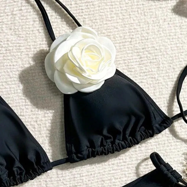 Black two-piece bikini with 3D flower lace detail and a split backless briefs design.