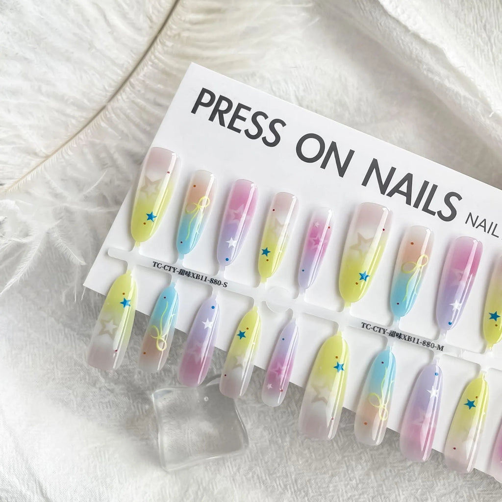 Dopamine Cartoon XINGX oval almond nail sticker set in sweet XB11-880 colour, natural frosted non-sealing layer, on a woman's nails.