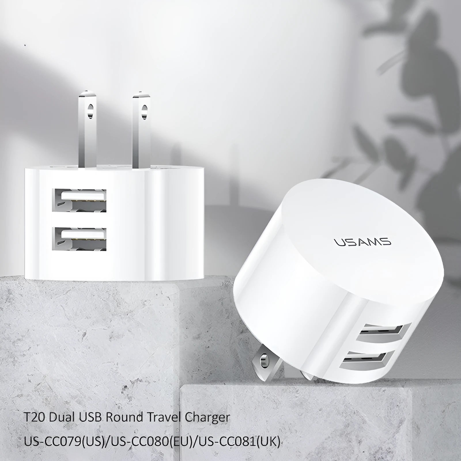 White portable universal dual USB phone charger with UK, EU, and US plugs